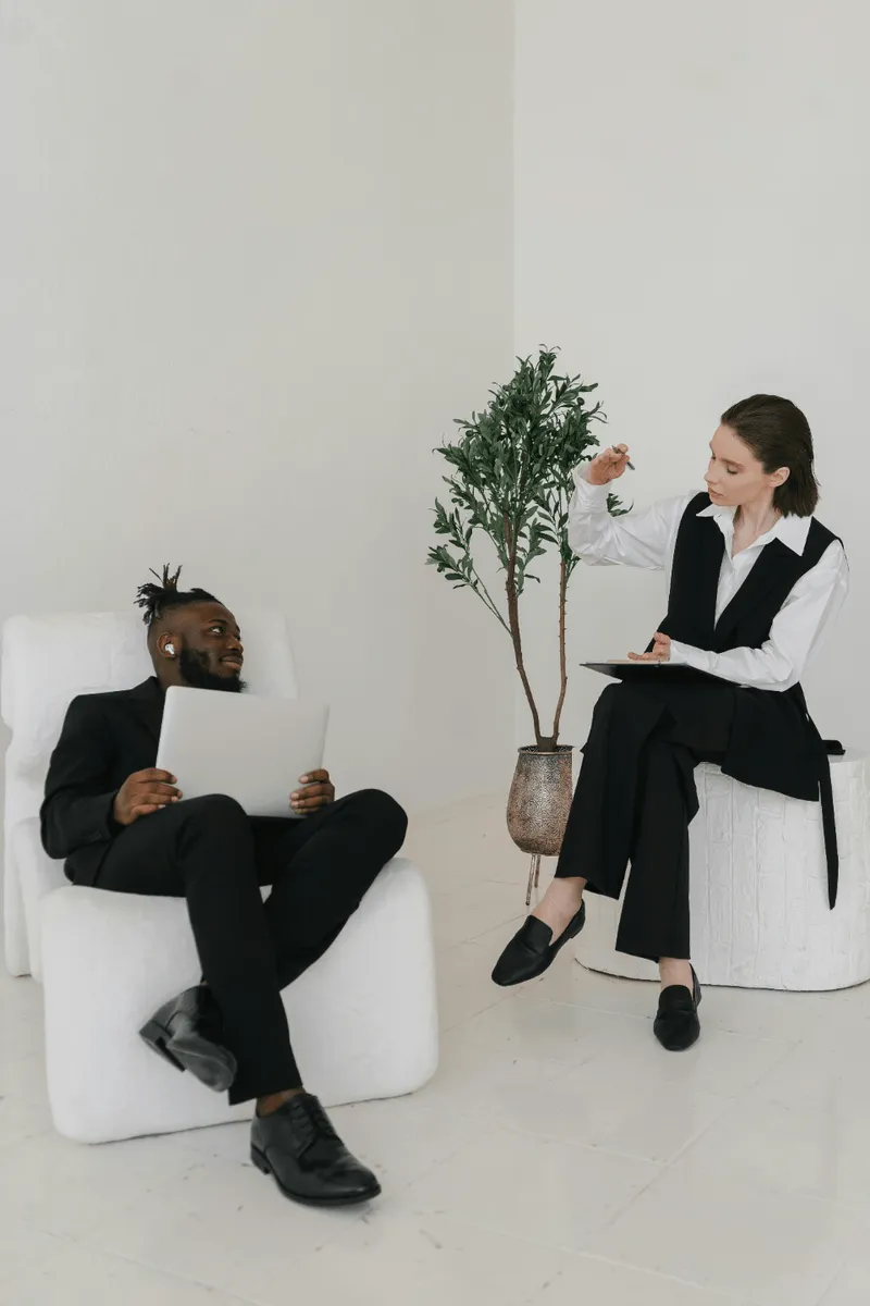 woman and man  sitting on a chair